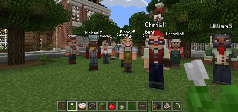 Group of Minecraft avatars with visible player names standing on a grassy area in front of a school building.