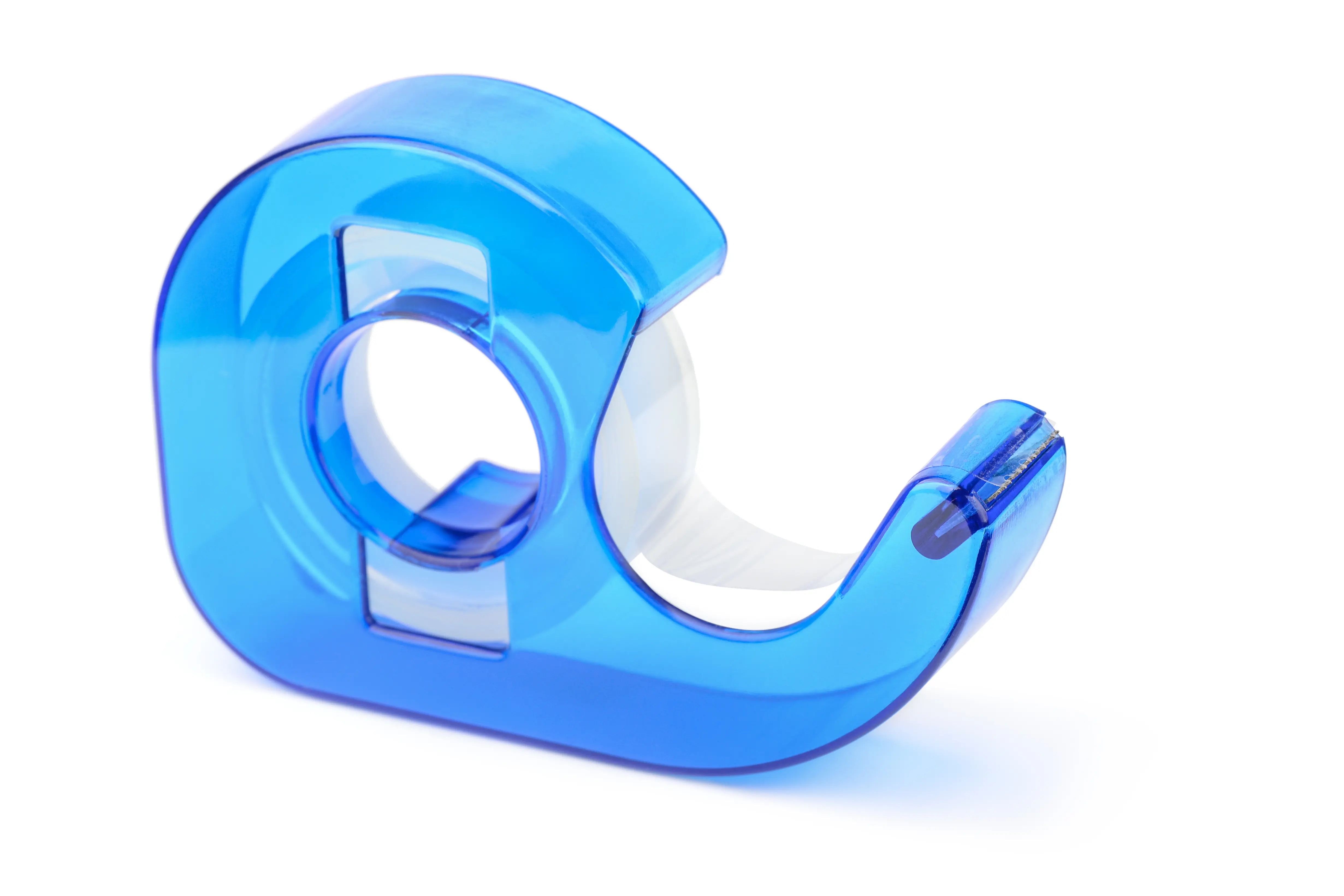 A blue translucent plastic tape dispenser loaded with a roll of clear adhesive tape on a white surface