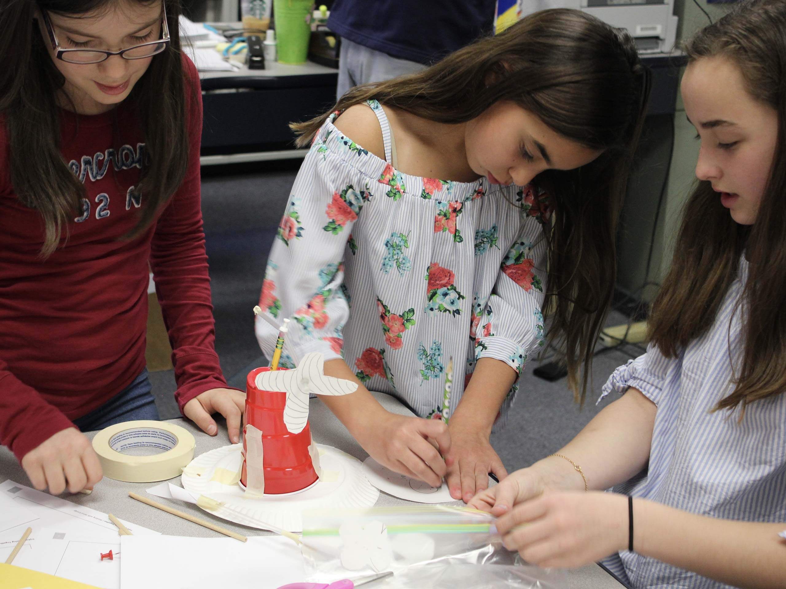 Young STEM Students collaborating on a project